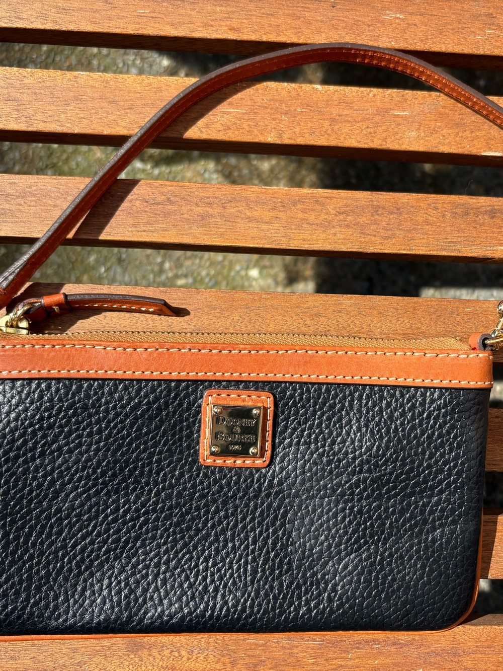 Dooney & Bourke Black Pebbled Leather Wristlet with Tan Trim and Gold Plate